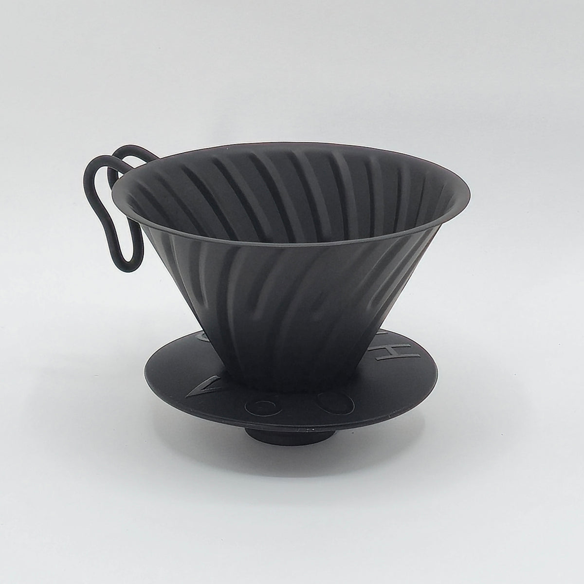 Hario V60-02 teräsdripper silikonijalustalla, musta